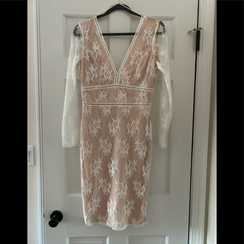 Classy lace dress. Long sleeve, fitted.